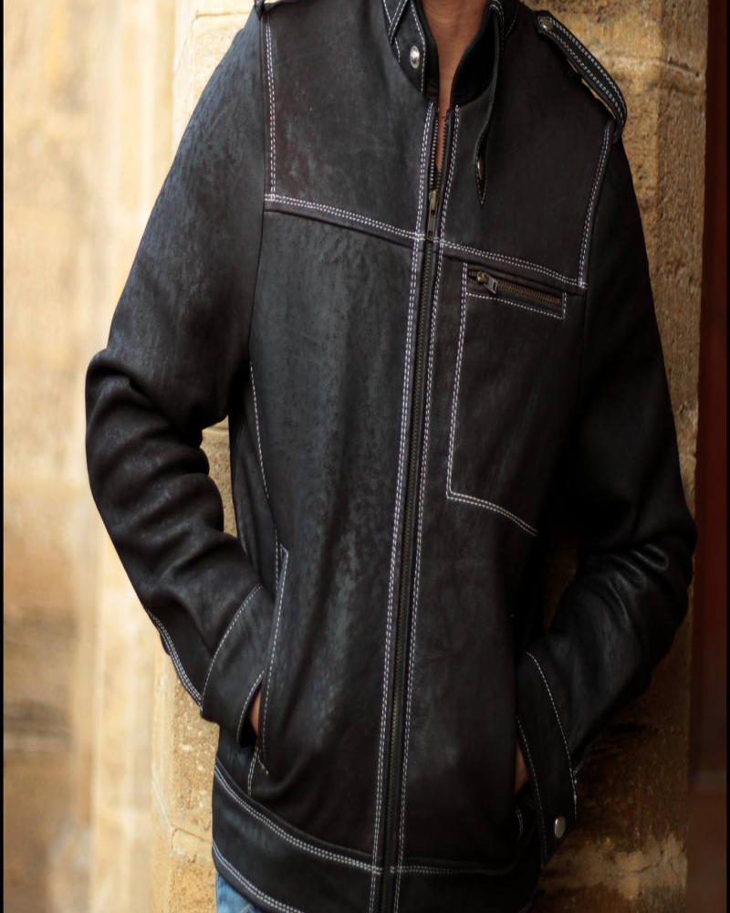 Black leather biker jacket with white contrast stitching and asymmetrical zipper