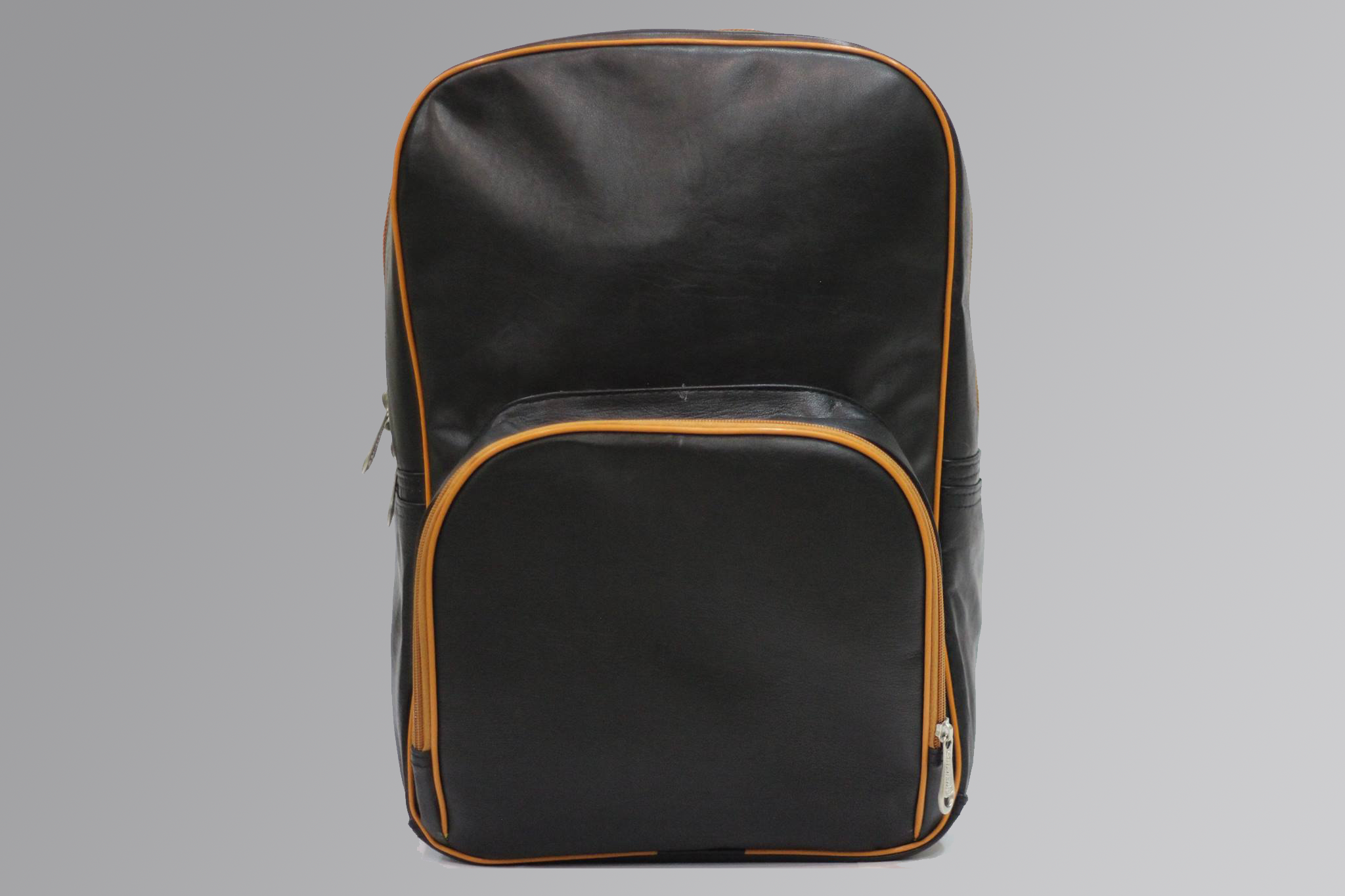 Black leather backpack with front zipper pocket and padded straps on white background