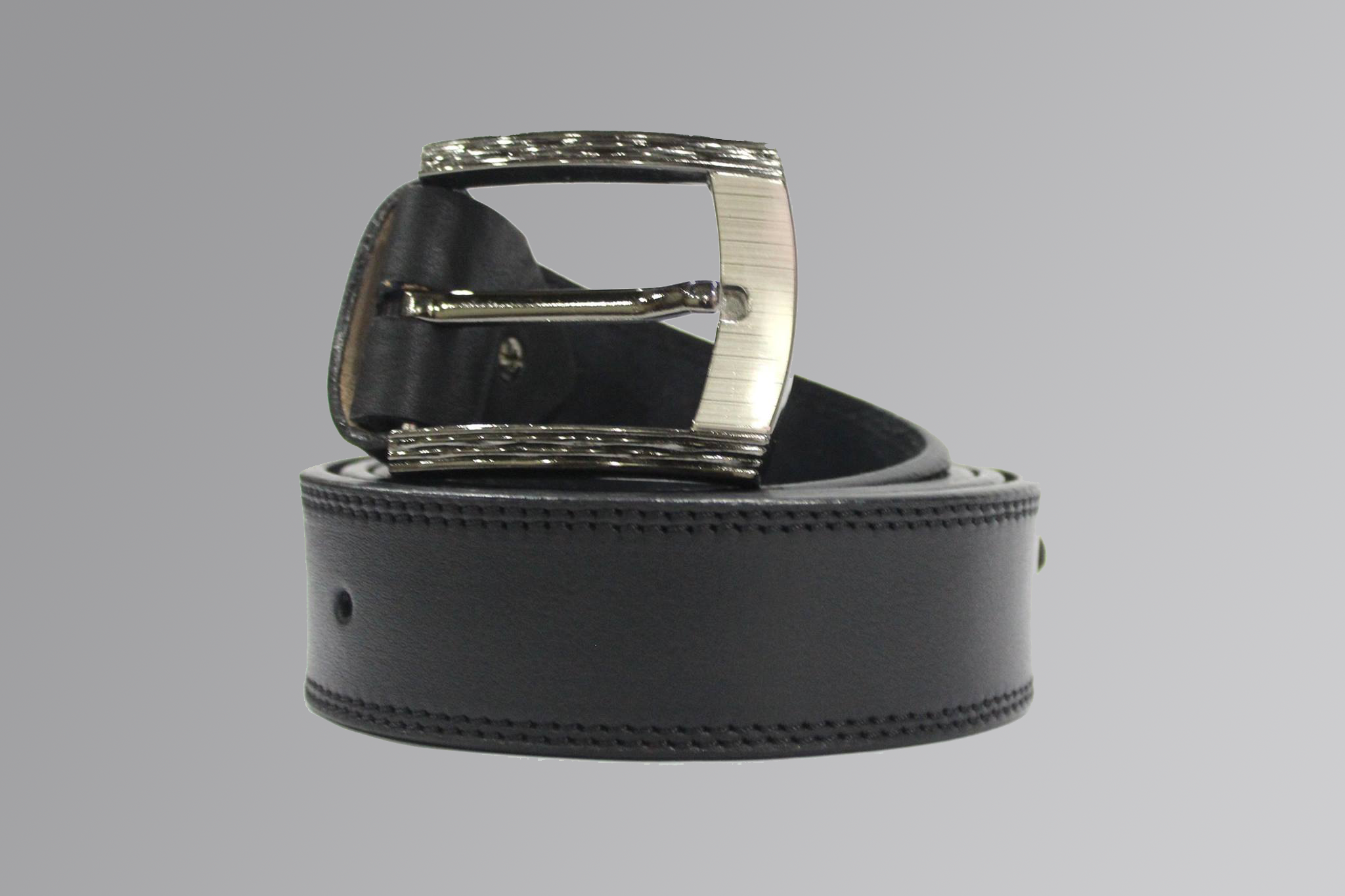 Brown leather casual belt with silver buckle on plain background