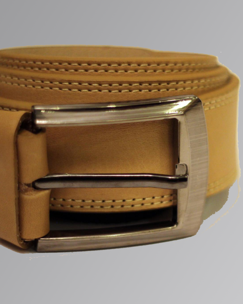 Textured cow nuck leather belt with metal buckle on neutral background