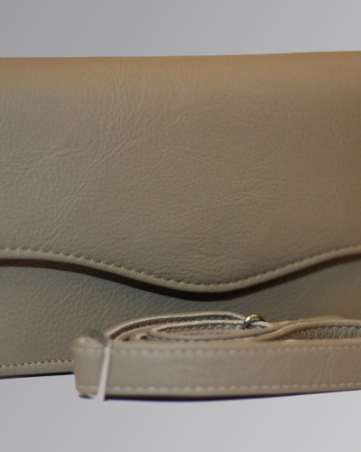 Elegant ladies leather purse with multiple compartments and sleek design.