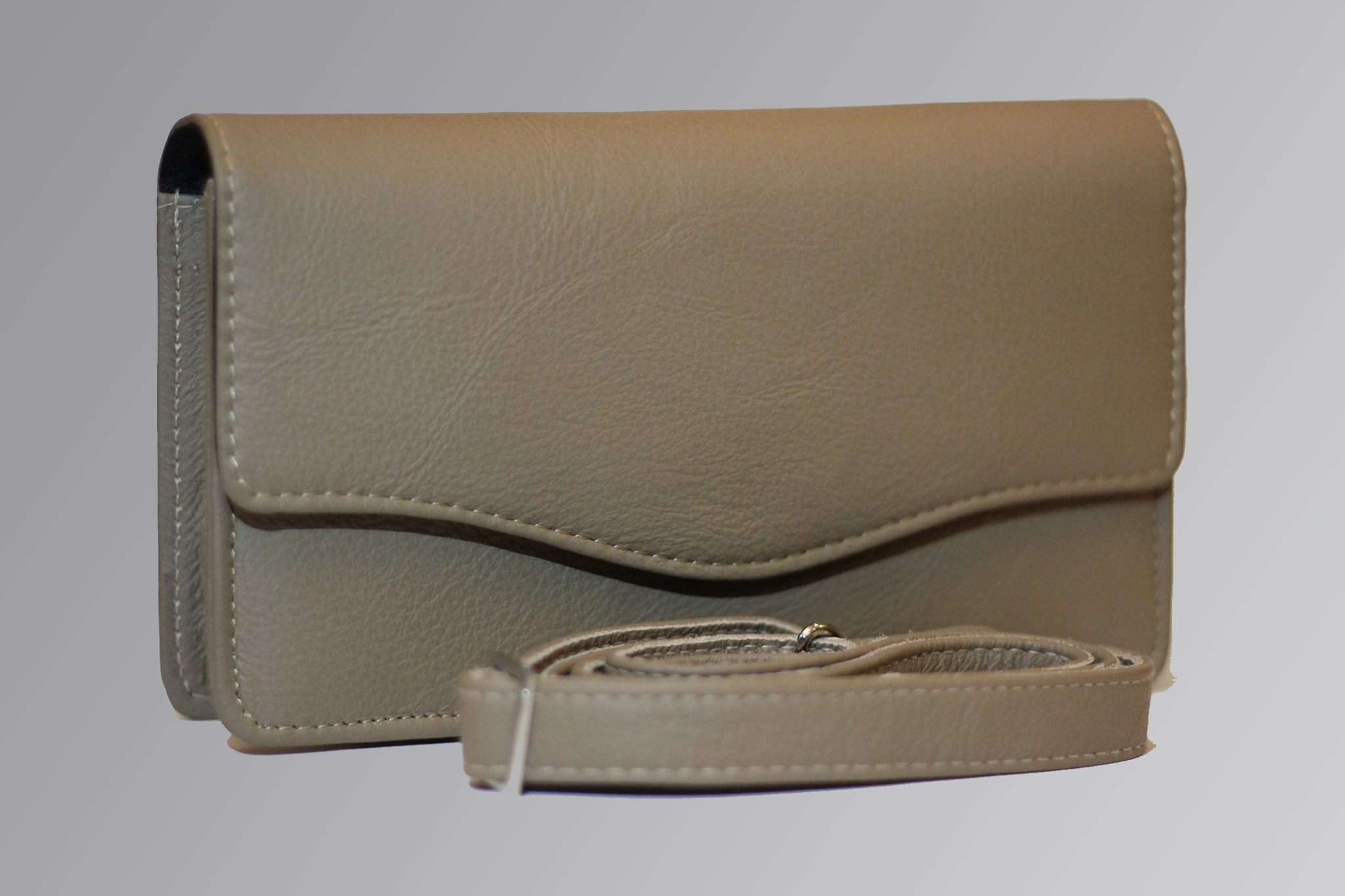 Elegant ladies leather purse with multiple compartments and sleek design.