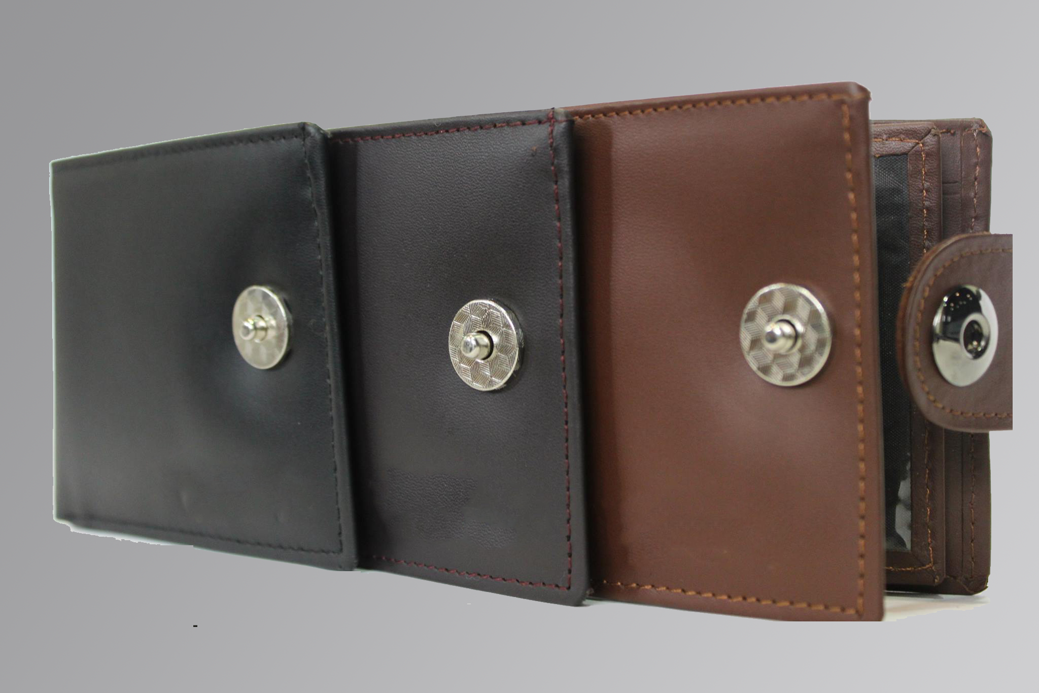 Men’s Nappa button wallet made from soft leather with a secure closure and multiple card slots.
