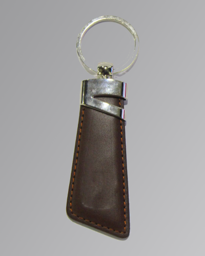 Slim leather keychain with metal ring on a clean background