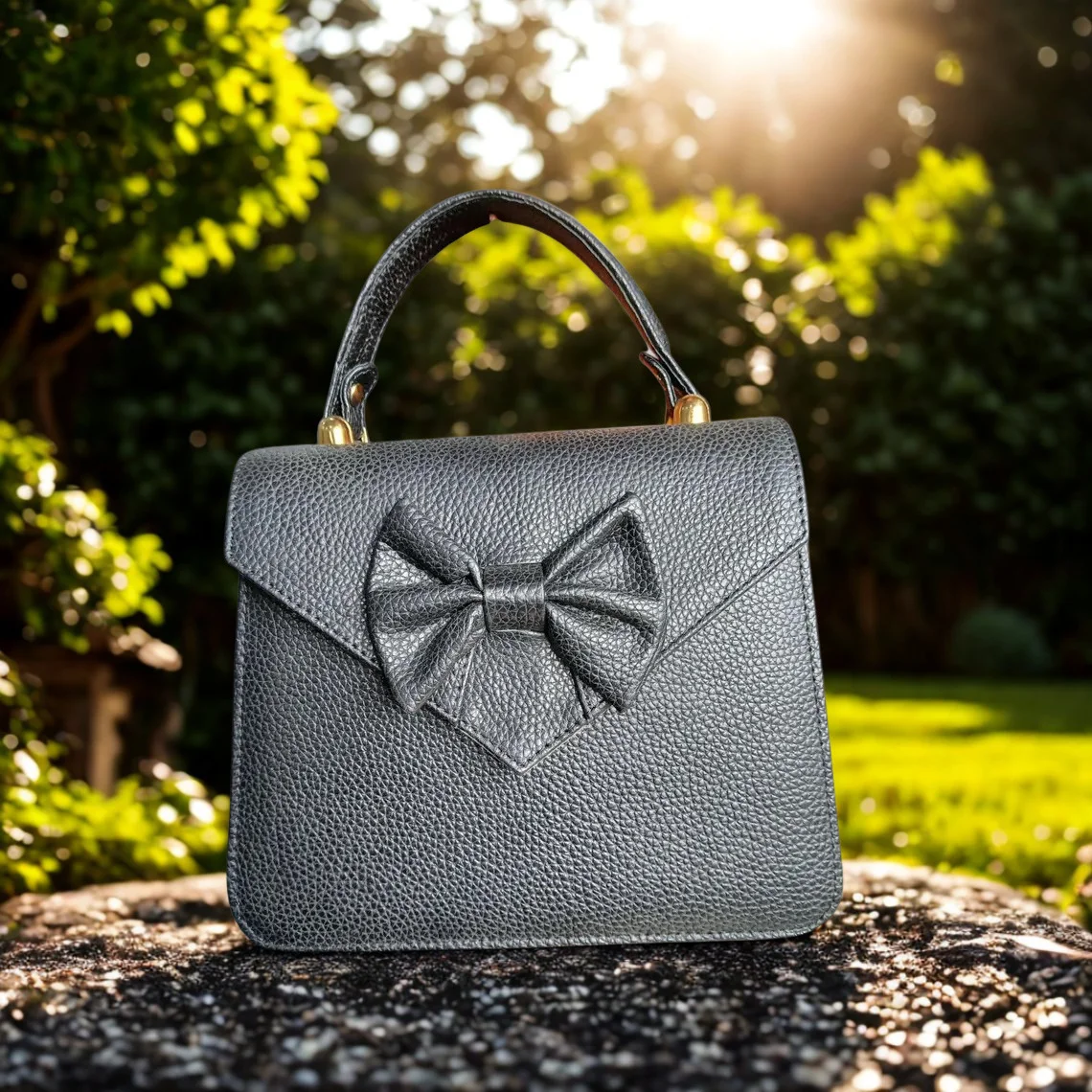 Leather Hill Bow Satchel in black