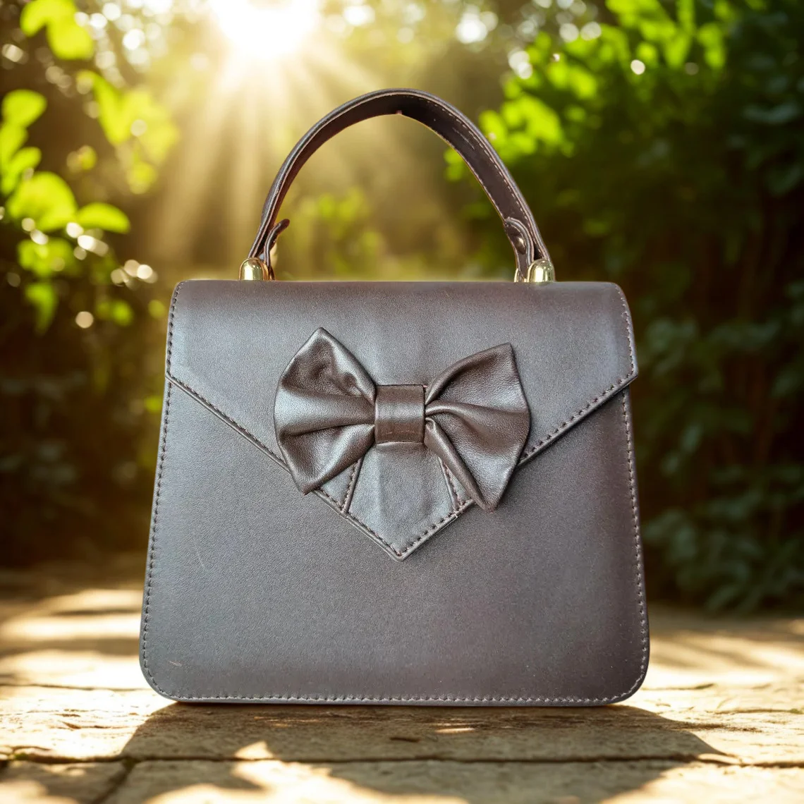Leather Hill Bow Satchel in brown
