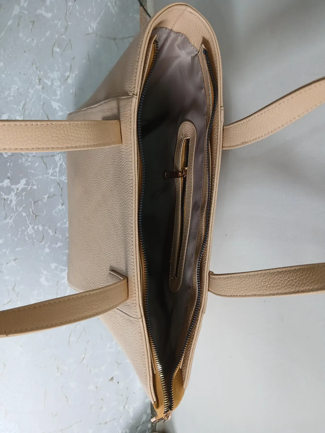 Inside view of Leather Hill beige leather tote bag